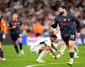 Gvardiol esulta dopo il gol al Real in Champions